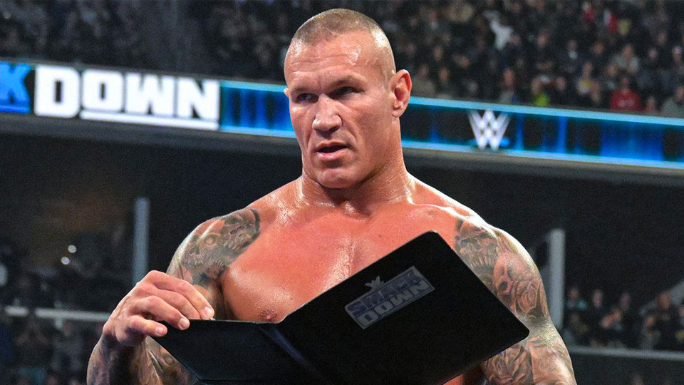 Randy Orton signs his contract with SmackDown